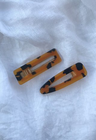 TWO ORANGE TORTOISE SHELL HAIR CLIPS