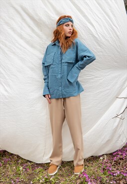 High-waisted linen trousers in elongated silhouette 
