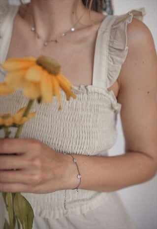 DELICATE CHAIN BRACELET WITH TEXTURED CIRCLE DISC PENDANTS