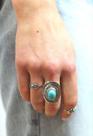 TIBETAN SILVER AND TURQUOISE OVAL SHAPED ADJUSTABLE RING