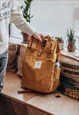 'THE TRAVELLER' RECYCLED LAPTOP BACKPACK IN MUSTARD