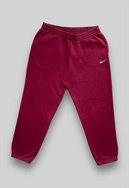 Nike Swoosh Baggy Relaxed Fit Joggers in Red