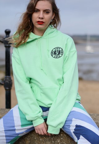 OVERSIZED HOODIE IN MINT WITH GRAPHIC LOGO.