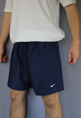 VINTAGE NIKE SHORTS IN NAVY WITH EMBROIDERED LOGO AND DRAWST