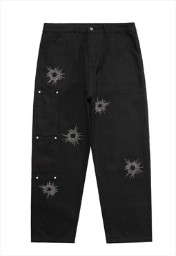 Straight jeans gunshot wound patch pants in black