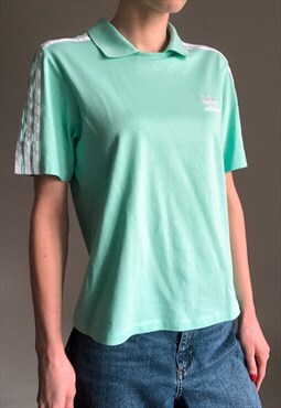 Vintage mint green t-shirt with embroidered trefoil logo