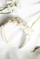 WHITE FLOWER EMBELLISHED HEADBAND WITH GEMS