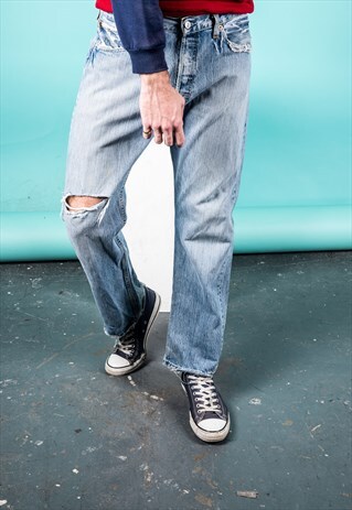 VINTAGE LEVI'S 501 JEANS IN BLUE DENIM WITH RIPS