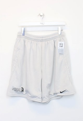 Vintage Nike shorts in white. Best fits L