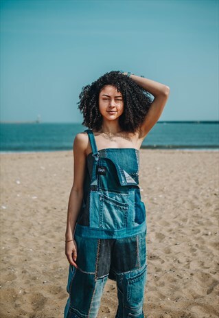 OVERSIZED DUNGAREES IN PATCHWORK RECYCLED DENIM