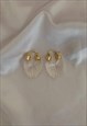 BUNNY. CLEAR WHITE RESIN SHELL HOOP EARRINGS