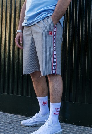 SHORTS WITH STRIPES AND LOGO
