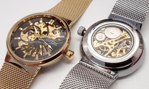 Gold and silver wind-up watches