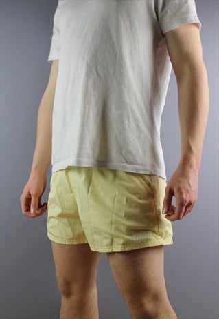 VINTAGE REEBOK SHORTS IN PALE YELLOW WITH POCKETS, EMBROIDER