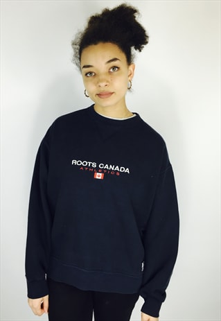 roots yellow sweater