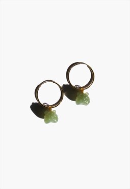 Year of the Tiger jade with gold hoop earrings