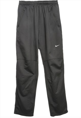 BEYOND RETRO VINTAGE NIKE TRACK PANTS - W26