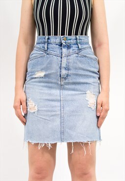 Vintage distressed denim skirt in grunge style