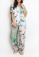 PALM PRINT BLOUSE AND FLARE TROUSER SET IN GREEN