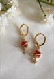ORION RED PLANET AND STAR HUGGIE HOOP EARRINGS