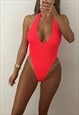 HALTER PLUNGE ONEPIECE IN NEON CORAL CRINKLE