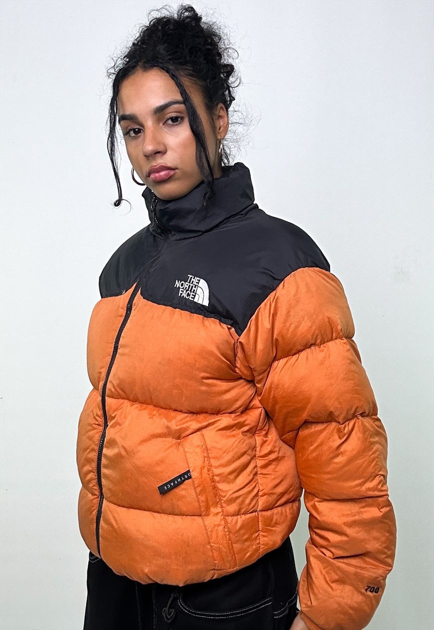 Orange and black 2025 north face jacket