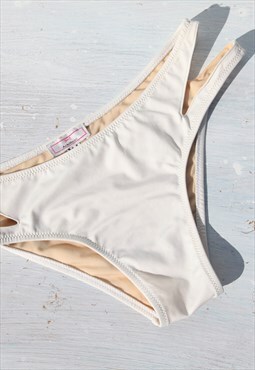 Off white lined bikini bottom with cut out details,swimwear