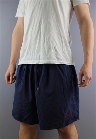 VINTAGE NIKE SHORTS IN NAVY WITH POCKETS, EMBROIDERED LOGO,