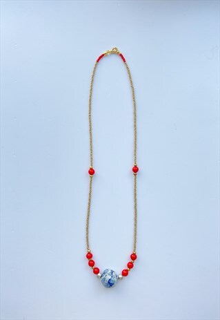 BEADED NECKLACE WITH CERAMIC BEAD