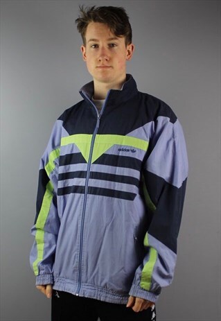 VINTAGE ADIDAS WINDBREAKER IN PURPLE WITH EMBROIDERED LOGO.