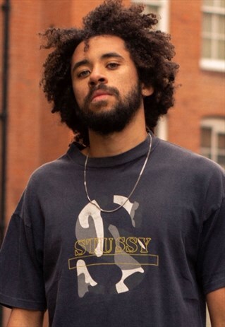VINTAGE STUSSY T SHIRT IN BLACK WITH CAMO SPELLOUT