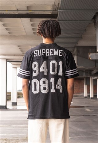 VINTAGE 2014 SUPREME SPELLOUT JERSEY IN BLACK AND WHITE