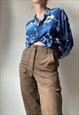 VINTAGE BLUE ABSTRACT FLORAL 90S BLOUSE SIZE SMALL/MEDIUM