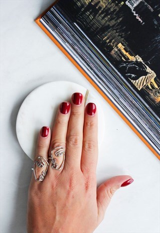 SILVER ABSTRACT FACE STATEMENT RING