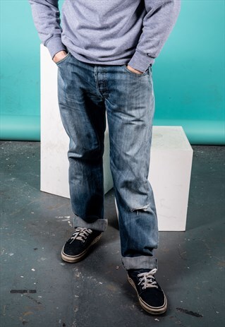 VINTAGE LEVI'S 501 JEANS IN BLUE DENIM WITH RIPS