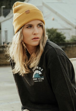 BEANIE HAT IN MUSTARD WITH LOGO TAB
