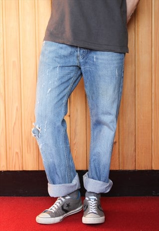 VINTAGE BLUE LEVI'S 512 RIPPED JEANS