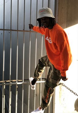 Baad hoodie  orange (  typo  DOMINATION  )