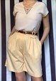 Vintage 80s pastel yellow bermuda shorts with pockets, large