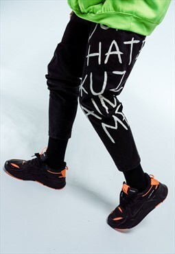 Black pants with hand painted side lettering
