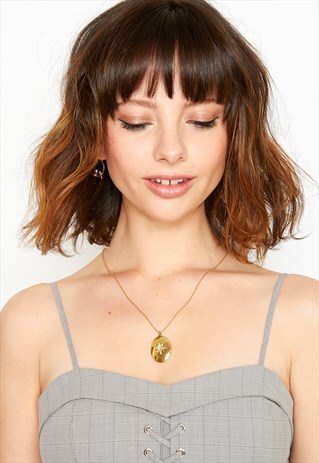 OVAL SHAPED OPENING LOCKET IN GOLD