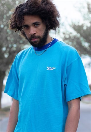 VINTAGE 90S REEBOK LOGO T SHIRT IN A BEAUTIFUL STRIPED BLUE