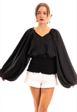 Puff sleeve smocked top in black