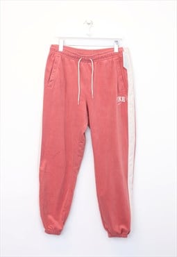 Vintage Nike joggers in pink and white. Best fits XL