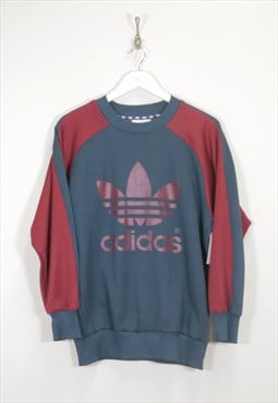 Vintage Adidas sweatshirt in blue and red. Best fits M