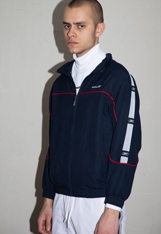 VINTAGE REEBOK SIDE STRIPE NAVY SHELL JACKET . UNISEX