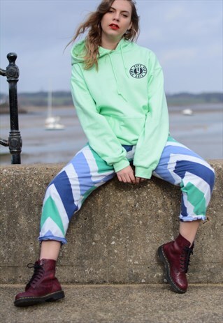 OVERSIZED HOODIE IN MINT WITH GRAPHIC LOGO.