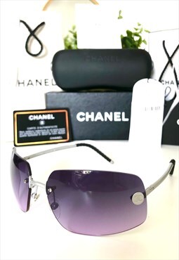 Chanel CC 4035 53-16 Purple rimless sunglasses. 