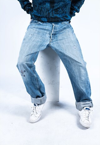 VINTAGE LEVI'S 501 JEANS IN BLUE DENIM WITH RIPS