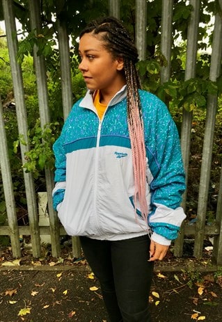 VINTAGE REEBOK CLASSIC ZIP PATTERN TRACKSUIT SHELL JACKET